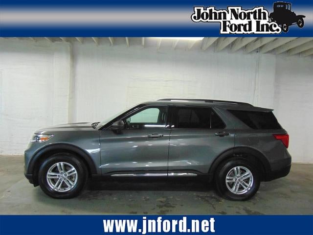 2022 Ford Explorer XLT in Carbonized Gray (M7) — front three-quarter view