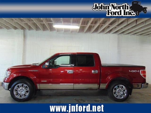 2014 Ford F-150 Platinum in Ruby Red Metallic Tinted Clear Coat (Rr) — front three-quarter view