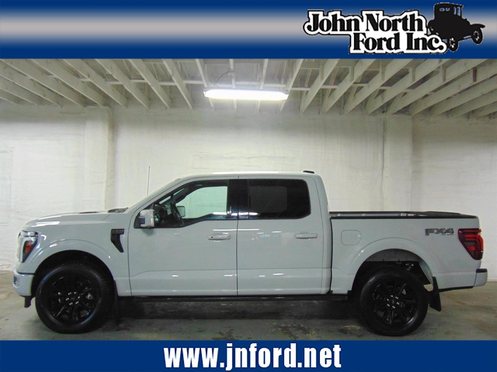 2024 Ford F-150 Platinum in Avalanche Gray (Dr) — front three-quarter view