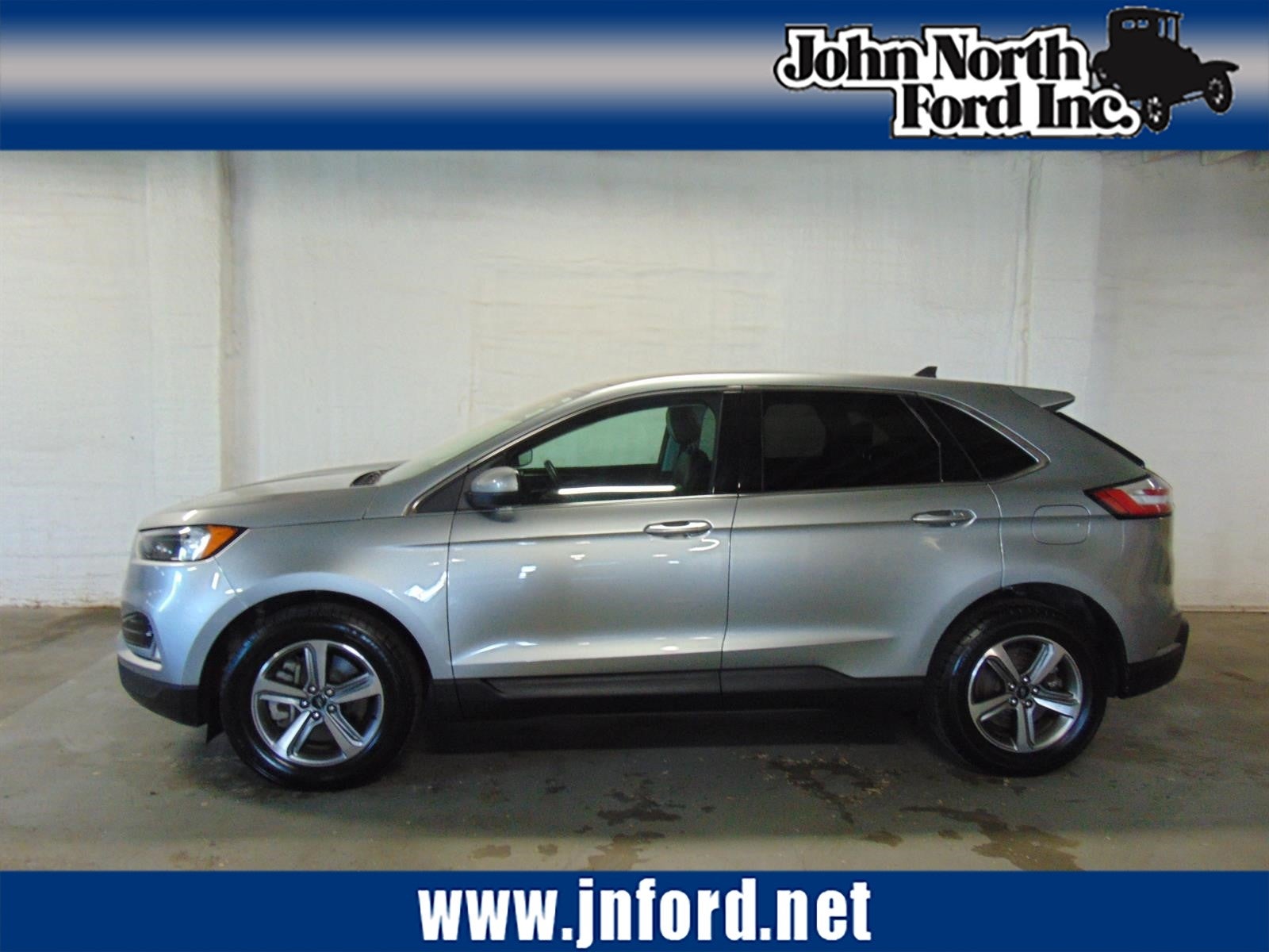 2024 Ford Edge SEL in Iconic Silver (Js) — front three-quarter view