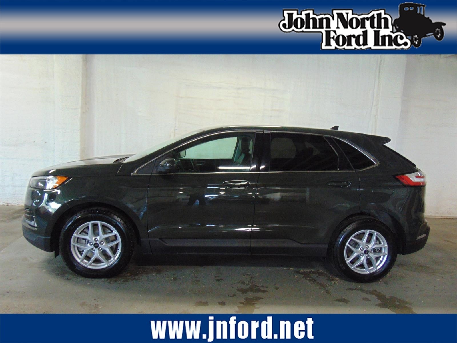 2024 Ford Edge SEL in Forged Green (L9) — front three-quarter view