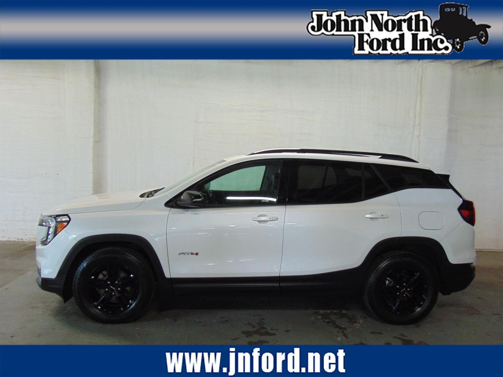 2022 GMC Terrain AT4 in White Frost Tricoat (G1w) — front three-quarter view