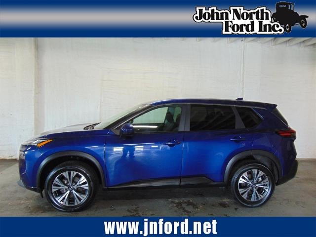 2023 Nissan Rogue SV in Caspian Blue Metallic (Rby) — front three-quarter view